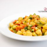 gnocchi con zucchine, gamberetti, pomodorini e zenzero