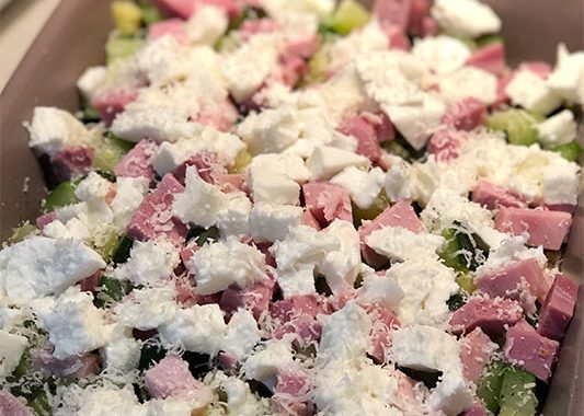 teglia con zucchine, mozzarella e prosciutto cotto